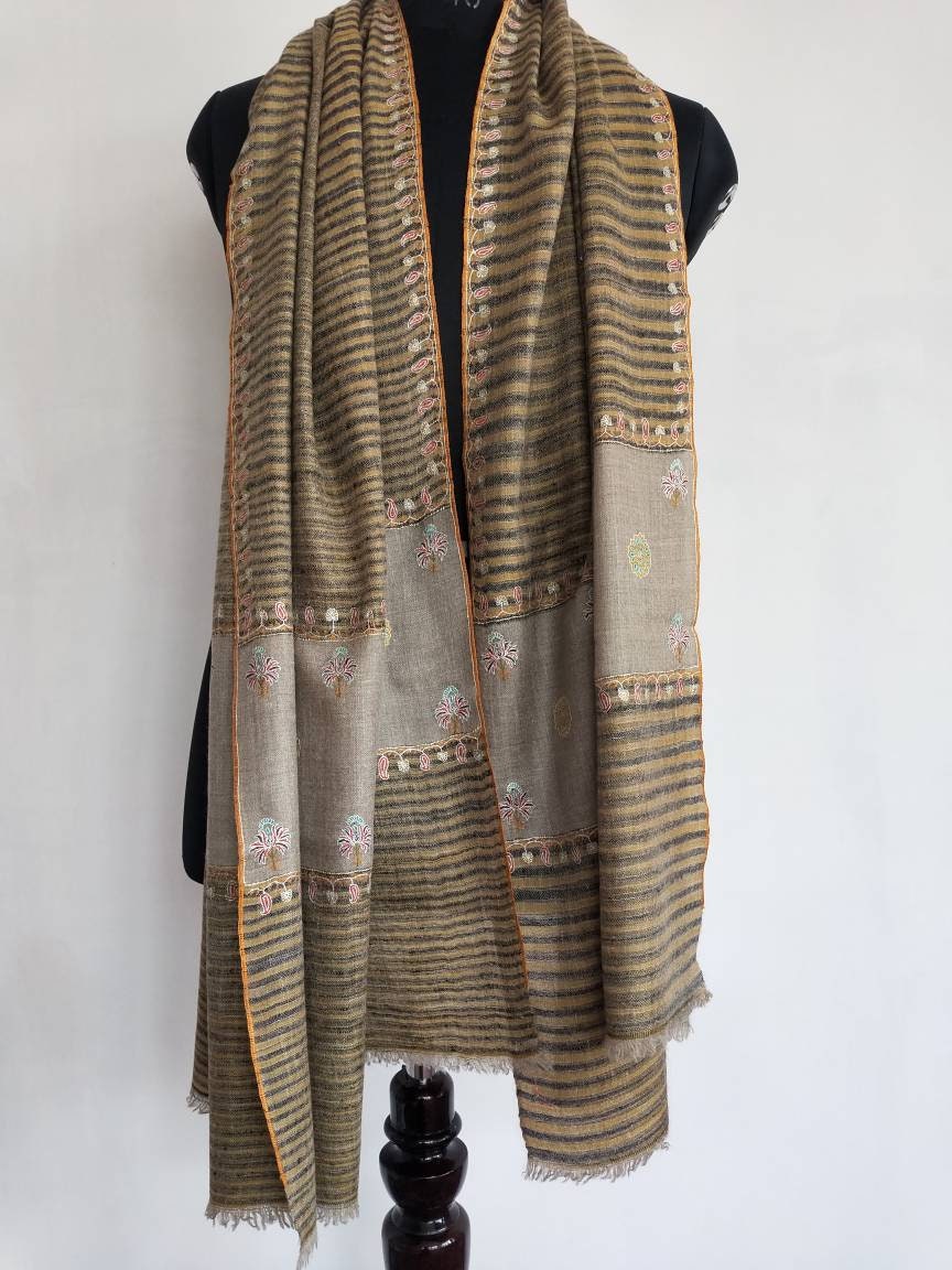 Ikat and sozni embroidery two different concepts go into making this masterpiece, original and unique kashmiri pashmina shawl,