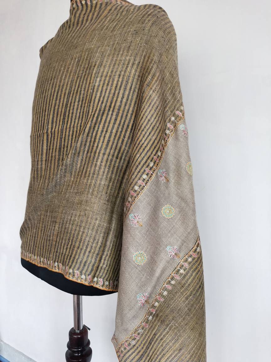 Ikat and sozni embroidery two different concepts go into making this masterpiece, original and unique kashmiri pashmina shawl,