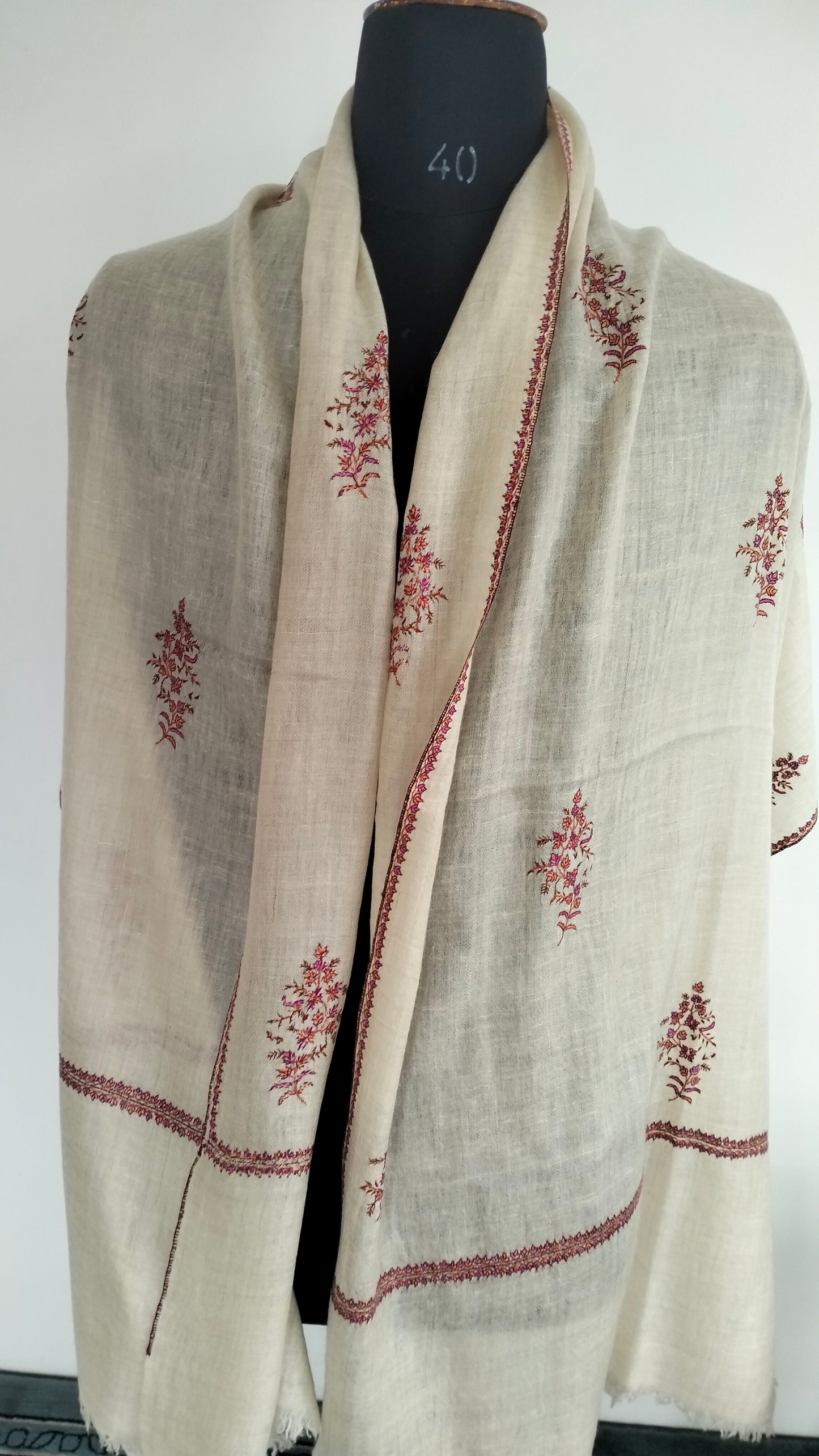 Natural white Bootidar Pashmina stole with exquisite motifs and incredible embroidery.